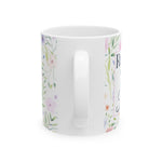 Back of the watercolor floral retirement mug, view of the white C-handle